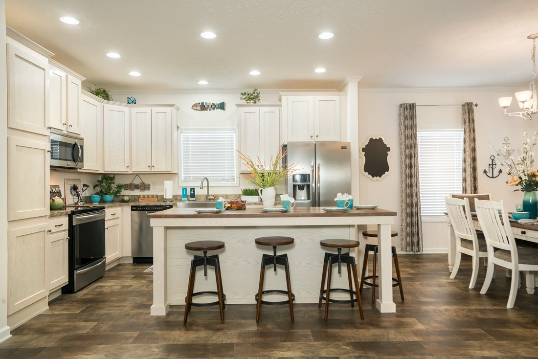 The 2466 OAKWOOD MOD Kitchen. This Manufactured Mobile Home features 3 bedrooms and 2 baths.