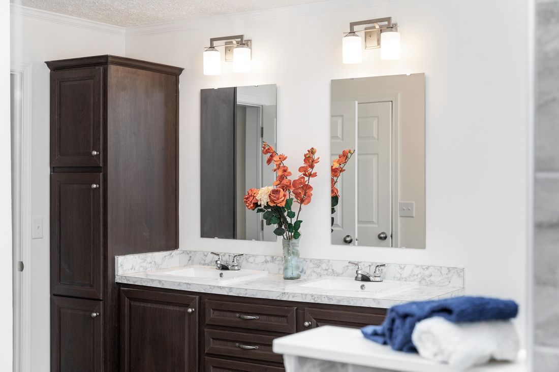 The 1321 CLASSIC Primary Bathroom. This Manufactured Mobile Home features 4 bedrooms and 2 baths.