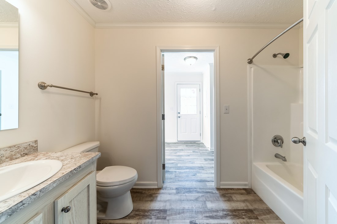 The 2091 CLASSIC Guest Bathroom. This Manufactured Mobile Home features 3 bedrooms and 2 baths.