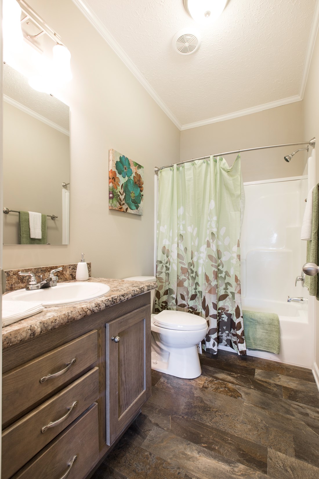 The 3328 CLASSIC Guest Bathroom. This Manufactured Mobile Home features 4 bedrooms and 2 baths.