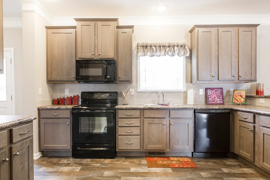 The 3328 CLASSIC Kitchen. This Manufactured Mobile Home features 4 bedrooms and 2 baths.